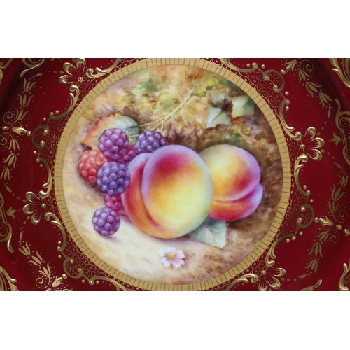 41 - A ROYAL WORCESTER CHINA CABINET PLATE, modern, of shaped circular form, centrally painted in colours... 