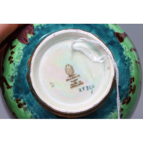 55 - A WEDGWOOD FAIRYLAND LUSTRE SMALL BOWL, 1930's, of plain circular form, printed in gilt and painted ... 