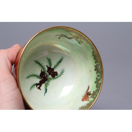 55 - A WEDGWOOD FAIRYLAND LUSTRE SMALL BOWL, 1930's, of plain circular form, printed in gilt and painted ... 