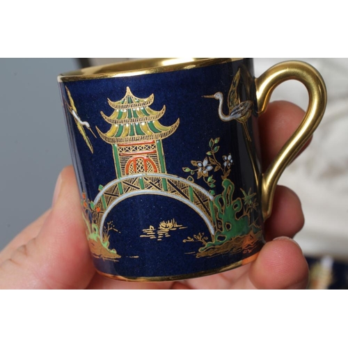 57 - A CARLTON WARE COFFEE SERVICE, 1930's, printed and painted in typical colours with a chinoiserie lan... 