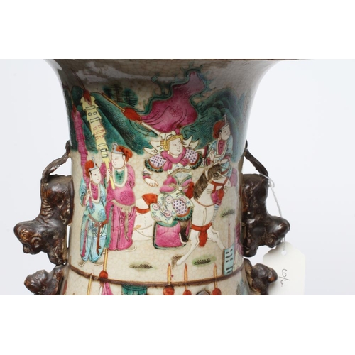 6 - A CHINESE ALCOVE VASE of rouleau form with shi-shi handles and applied salamanders to the shoulders ... 