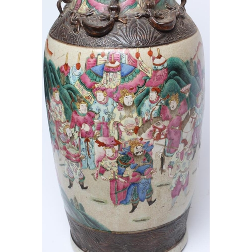 6 - A CHINESE ALCOVE VASE of rouleau form with shi-shi handles and applied salamanders to the shoulders ... 