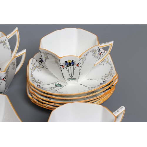 62 - AN ART DECO SHELLEY CHINA QUEEN ANNE TEA SERVICE printed and overpainted with the 