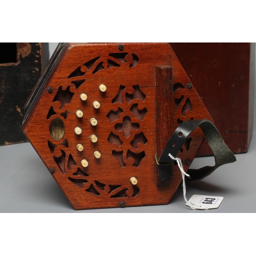 643 - A LACHENAL & CO., LONDON CONCERTINA, Serial No. 14810, with mahogany ends and twenty-one bone button... 