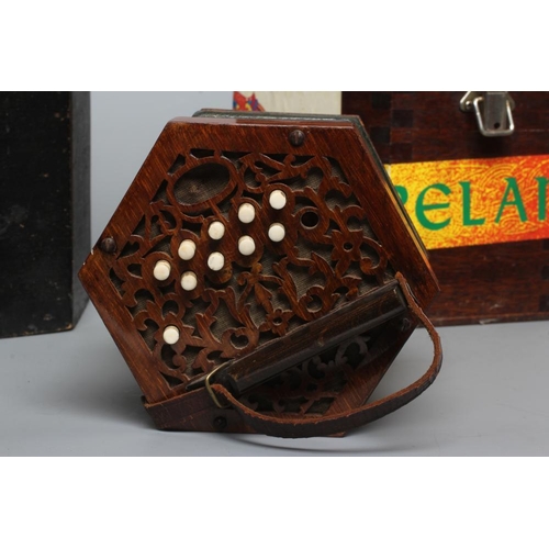 644 - A LACHENAL & CO., LONDON CONCERTINA, Serial No. 84297, with mahogany ends and twenty one bone button... 