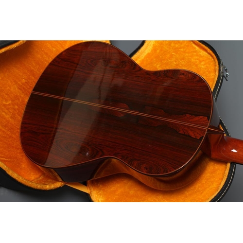 649 - A JAPANESE CLASSICAL GUITAR by Hiroshi Tamura, with red and black stained inlaid sound hole, the mac... 