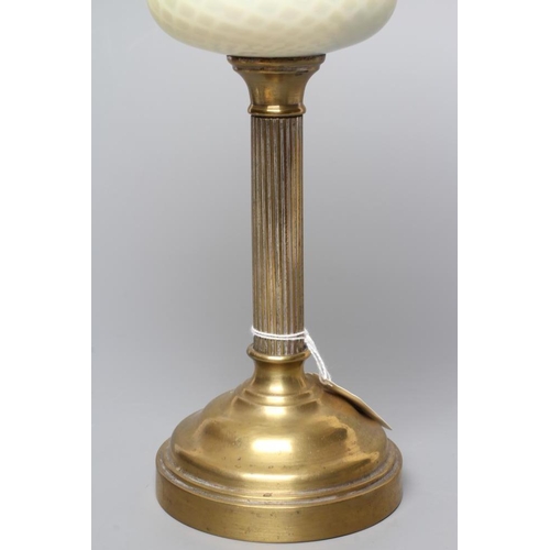 664 - A SMALL VICTORIAN BRASS OIL LAMP, the yellow and white satin glass ball shaped shade and reservoir w... 