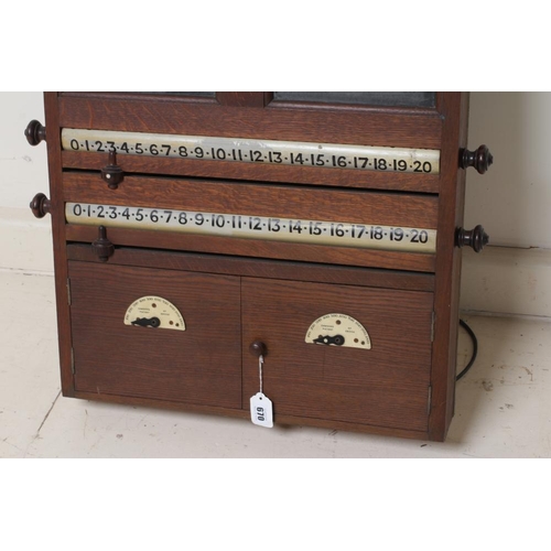 670 - AN OAK BILLIARD ROOM SCORE BOARD, c.1900, of oblong form with moulded cornice over an early electric... 