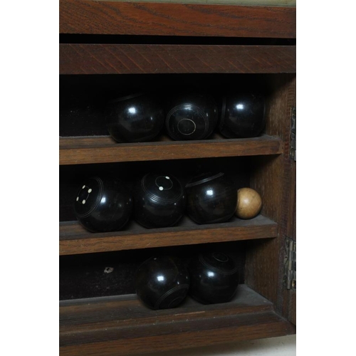 670 - AN OAK BILLIARD ROOM SCORE BOARD, c.1900, of oblong form with moulded cornice over an early electric... 