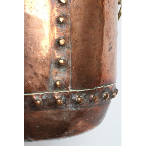 673 - A COPPER LOG BIN, early 20th century, of cylindrical form with moulded rim, riveted seams and brass ... 