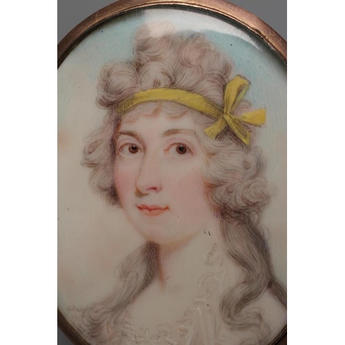 712 - ENGLISH SCHOOL (c.1800) A Lady, wearing a yellow ribbon in her hair, oval miniature on ivory with ha... 