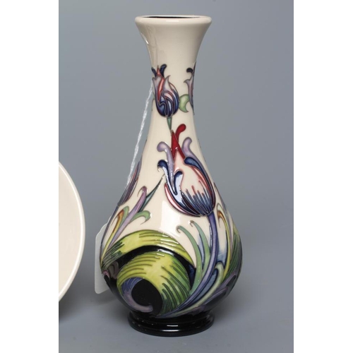 72 - A MOORCROFT POTTERY DEBBIE'S DREAM VASE, 2015, of slender baluster form tubelined and painted in col... 