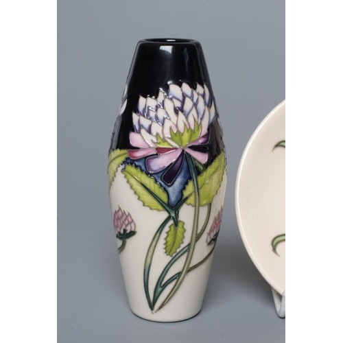 72 - A MOORCROFT POTTERY DEBBIE'S DREAM VASE, 2015, of slender baluster form tubelined and painted in col... 