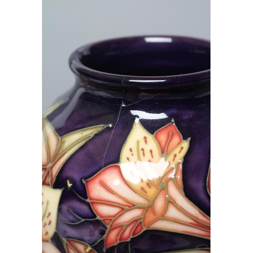 77 - A MOORCROFT POTTERY PERUVIAN VASE, 2003, of inverted baluster form, tubelined and painted in shades ... 