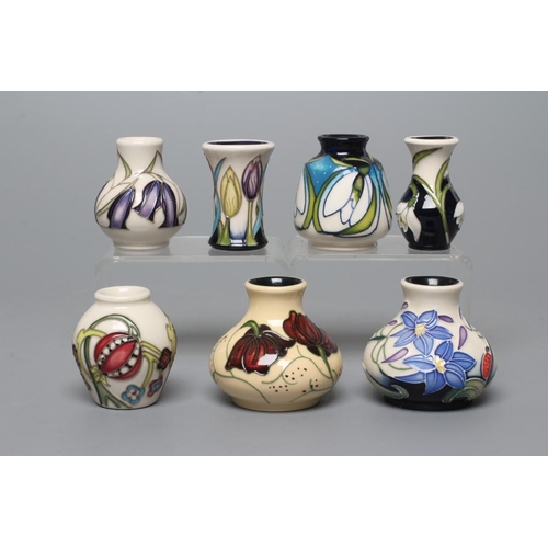 83 - SEVEN MINIATURE MOORCROFT POTTERY VASES, comprising Krokus, Soulful Cheer, Forde Abbey, Chocolate Co... 