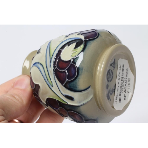 84 - A MOORCROFT POTTERY SMALL VASE, 2015, of flared rounded form tubelined and painted in colours with t... 