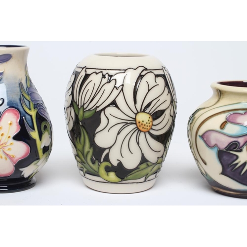 85 - THREE MOORCROFT POTTERY SMALL VASES, comprising Sprays of Spring, 2014, 3 3/4