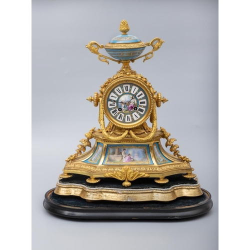 855 - A FRENCH GILT METAL AND PORCELAIN MANTEL CLOCK, late 19th century, the twin barrel drum movement rac... 