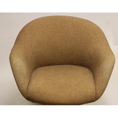 869 - A RETRO TEAK FRAMED TUB LOUNGE CHAIR upholstered in brown tweed, raised on four rounded square secti... 