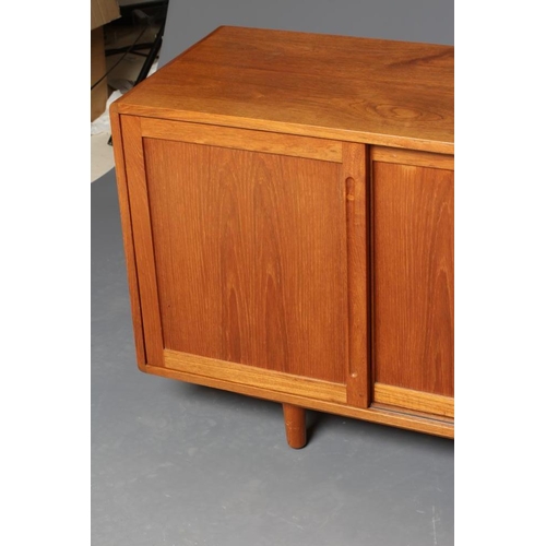 879 - A SWEDISH TEAK RETRO SIDEBOARD, mid 20th century, the fascia with four sliding panelled doors with i... 