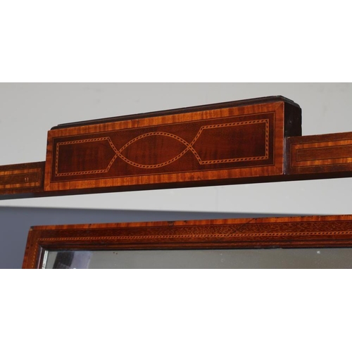 891 - AN EDWARDIAN MAHOGANY CHEVAL MIRROR with satinwood banding and chequer stringing, the oblong plate o... 