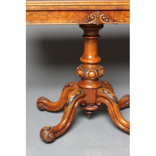 898 - A VICTORIAN BURR WALNUT FOLDING CARD TABLE, the moulded edged rounded oblong top opening to interior... 