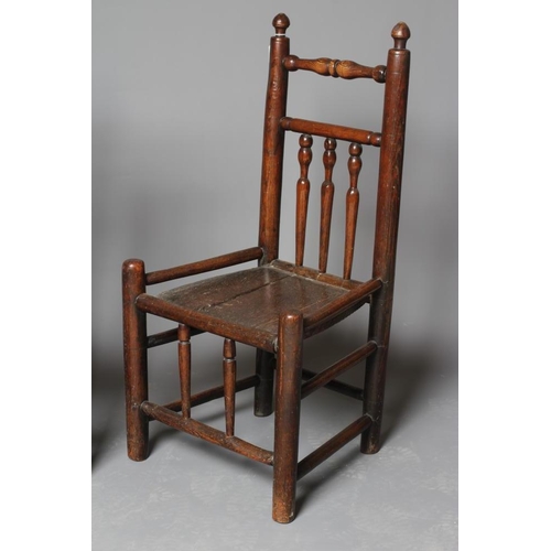 905 - AN ASH AND OAK BACKSTOOL, c.1700 (?), the plain uprights with incised banding and turned finials, sp... 