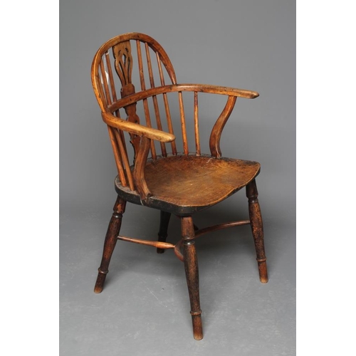 912 - A YEW AND ELM WINDSOR ARMCHAIR, 19th century, of low hoop back form with pierced fleur de lys splat,... 