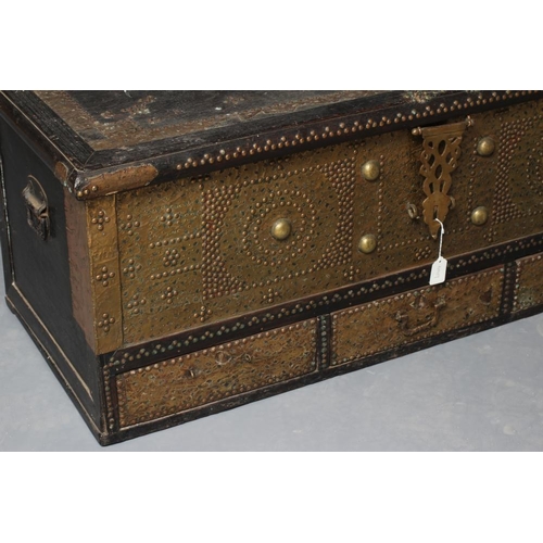 913 - A NORTH AFRICAN EBONY (?) CHEST, c.1900, with brass studwork, the hinged lid with pierced brass hand... 