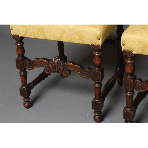 920 - A PAIR OF OAK 17TH CENTURY STYLE BACKSTOOLS, modern, upholstered in yellow silk damask, arched padde... 