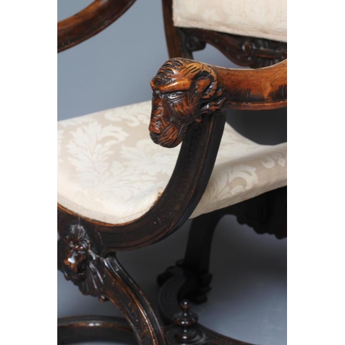 933 - A STAINED BEECH (?) X FRAMED CHAIR, 20th century, upholstered in ivory damask, scroll edged padded b... 