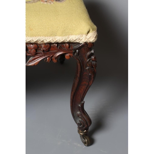 944 - A VICTORIAN DRESSING STOOL of oblong form in rosewood and mahogany, the seat upholstered in gros poi... 