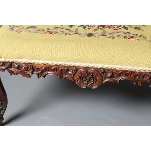 944 - A VICTORIAN DRESSING STOOL of oblong form in rosewood and mahogany, the seat upholstered in gros poi... 