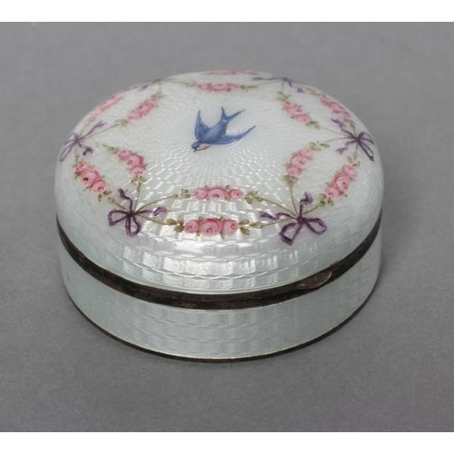 169 - AN ENAMEL BOX AND COVER, stamped 935, of circular form painted with a bluebird within a ribbon tied ... 