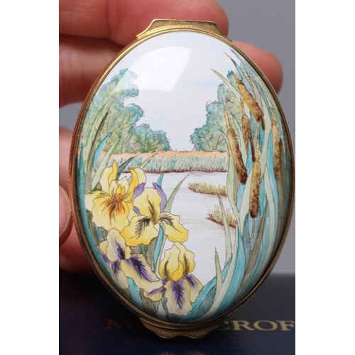 170 - A MOORCROFT ENAMEL OVAL BOX AND COVER, 2018, painted with the Willow Fen pattern, black printed mark... 