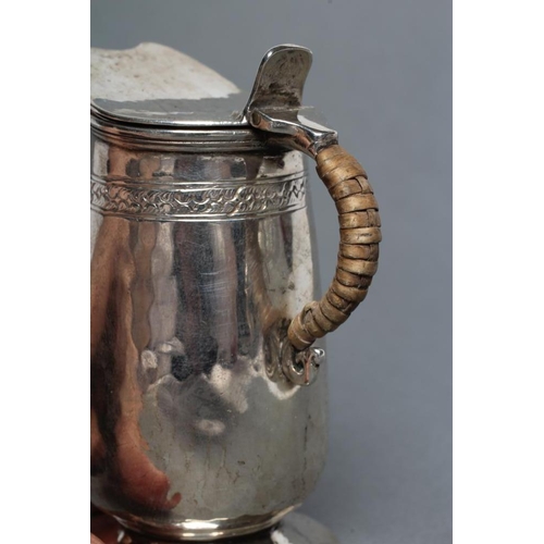 192 - A MINIATURE SILVER JUG, maker Liberty & Co., Birmingham 1920, of tapering rounded cylindrical form w... 