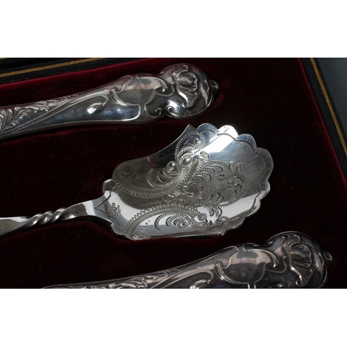 195 - AN EDWARDIAN SILVER THREE PIECE AFTERNOON TEA SERVING SET, maker John Biggin, Sheffield 1906, with a... 