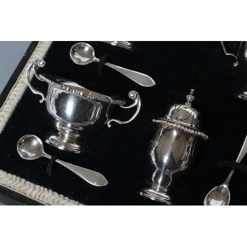 200 - A SEVEN PIECE SILVER CRUET, maker Manoah Rhodes, London 1918, of campana form with everted gadrooned... 