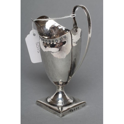 201 - A LATE GEORGE III SILVER HELMET JUG, maker Peter and Ann Bateman, London 1792, of plain form with pu... 