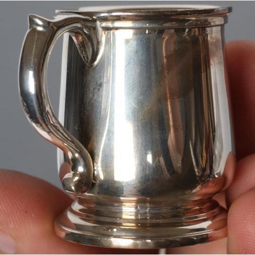 208 - A SET OF SIX MINIATURE SILVER MUGS, maker Adie Bros., Birmingham 1926, of plain baluster form with s... 