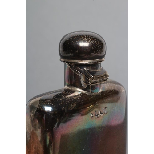 221 - A LATE VICTORIAN SILVER HIP FLASK, maker Huttons, London 1901, of plain rounded oblong form with pat... 