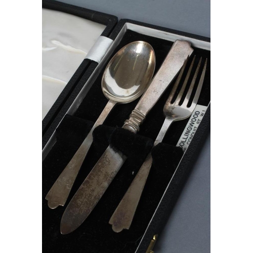 242 - A THREE PIECE SILVER CHRISTENING SET, maker Wakely & Wheeler, London 1949/52/53, comprising dog nose... 