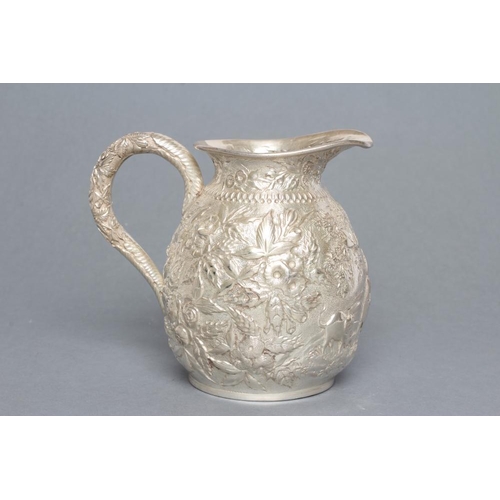 252 - AN AMERICAN SILVER JUG, maker S. Kirk & Son, 1861-1868, of bombe cylindrical form, chased and repous... 