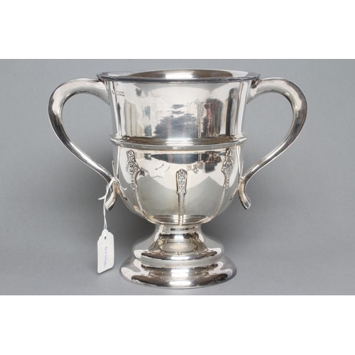 261 - AN ARTS AND CRAFTS SILVER TWO HANDLED TROPHY, maker Goldsmiths & Silversmiths Co. Ltd., London 1912,... 