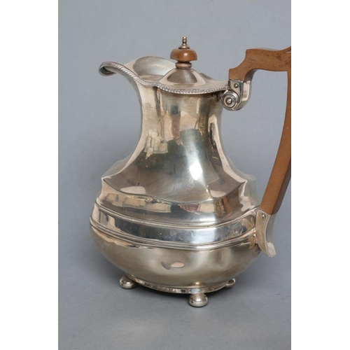 262 - A SILVER TEAPOT AND MATCHING COFFEE POT, maker Sissons & Sissons, Sheffield 1926, of oblong baluster... 