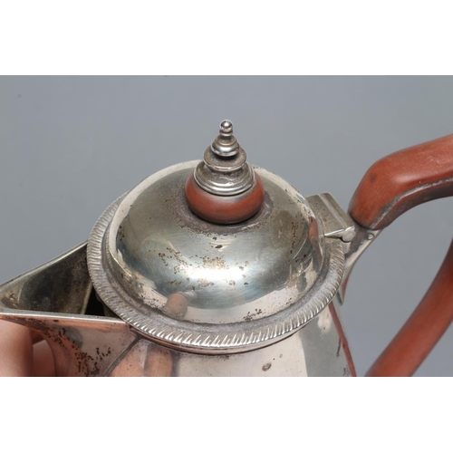 269 - A SILVER HOT WATER JUG, maker Barraclough & Barraclough, London 1933, of rounded tapering cylindrica... 