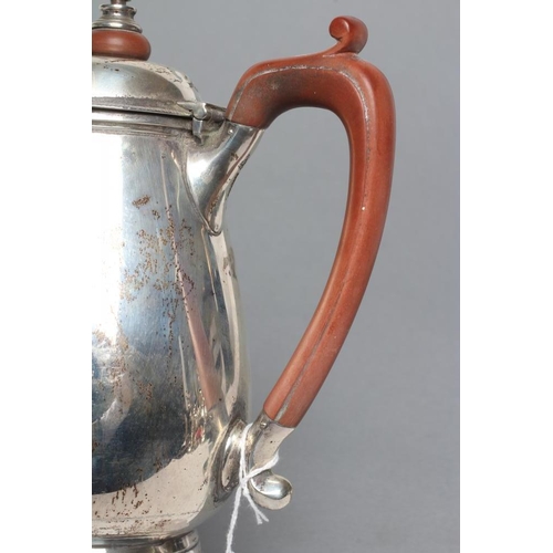 269 - A SILVER HOT WATER JUG, maker Barraclough & Barraclough, London 1933, of rounded tapering cylindrica... 