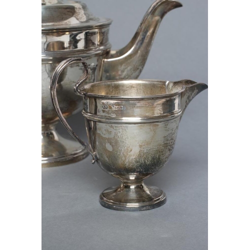 273 - A THREE PIECE SILVER TEA SERVICE, maker Viners, Sheffield 1933 (teapot) and 1934, of single girdled ... 