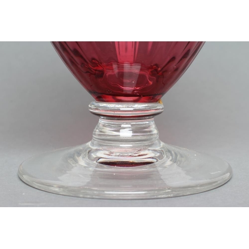 279 - A SILVER MOUNTED CRANBERRY GLASS CLARET JUG, maker's mark WW, London 2001, the lightly ribbed ovoid ... 