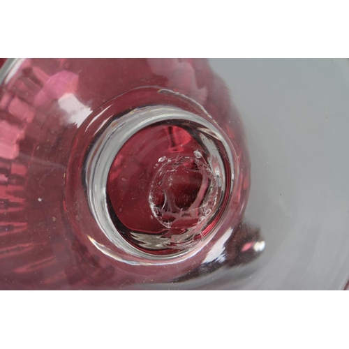 279 - A SILVER MOUNTED CRANBERRY GLASS CLARET JUG, maker's mark WW, London 2001, the lightly ribbed ovoid ... 